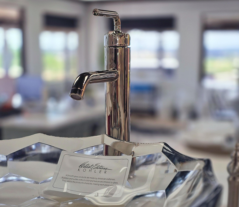 showroom faucet and glass sink